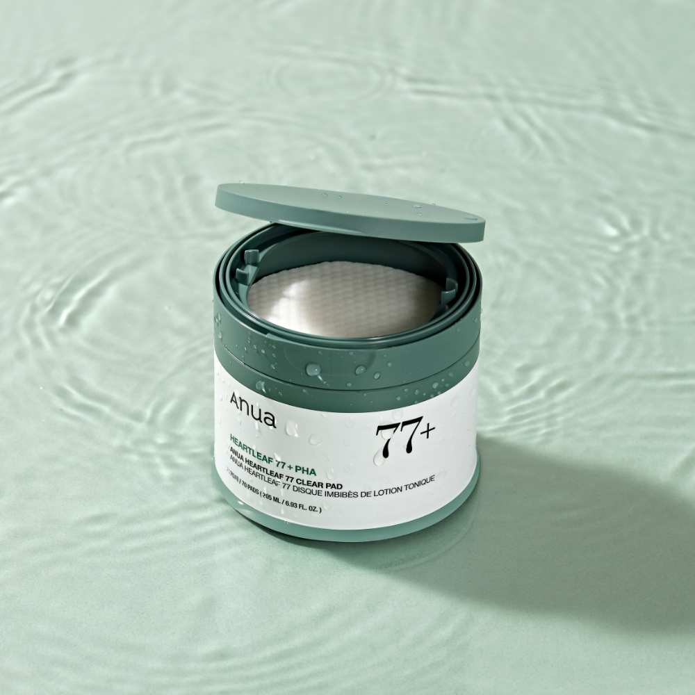 Anua HEARTLEAF 77 CLEAR PAD container with product label, featuring heartleaf soothing cleansing pads for skincare.
